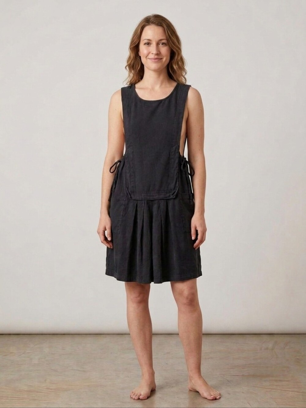 Jennifer Glasgow Sleeveless Black Romper Dress with Front Pockets